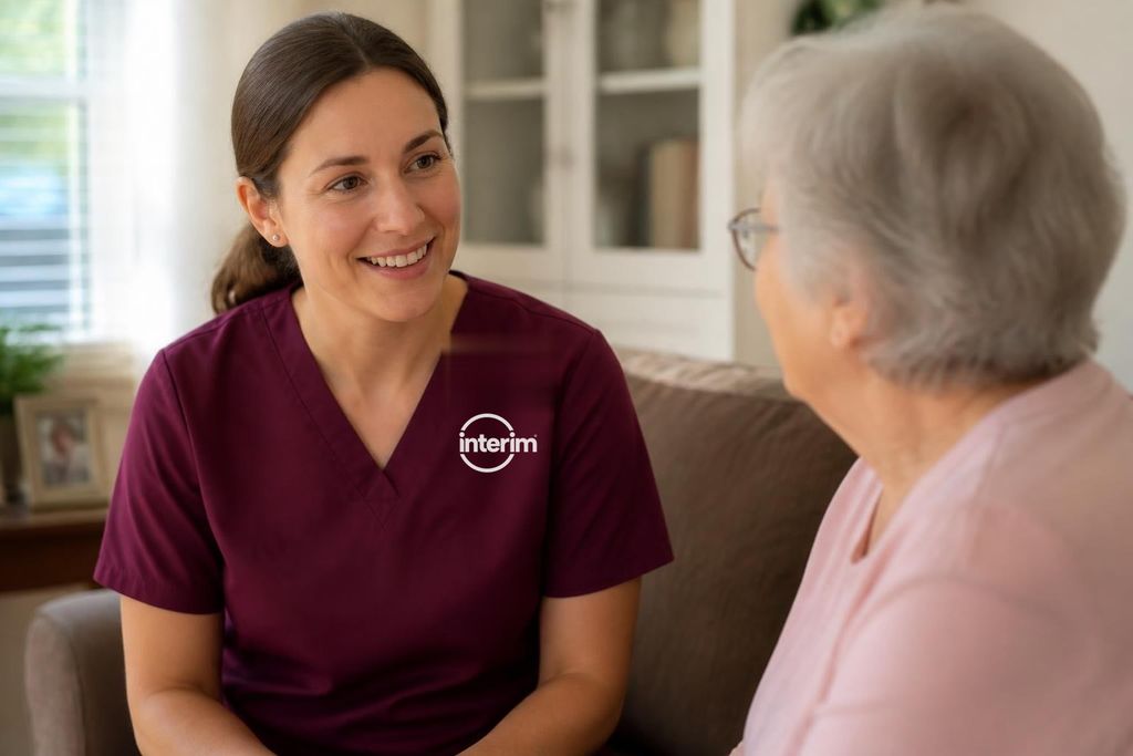 Care Professional providing one-on-one private duty care to a senior client at home.