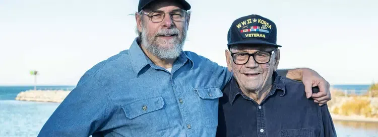 An older veteran being cared for at home by an in-home caregiver